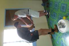 Graham-Ian-putting-up-pin-boards-that-they-built